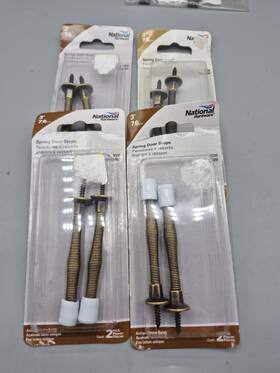 National Hardware 038613159020 4 Packs Of 2 Spring Door Stops - Antique Brass Finish 3 Inch