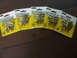 16 New Pairs Of Stanley Brass Plated Ornamental Hinges. Fixed Price $30.00.